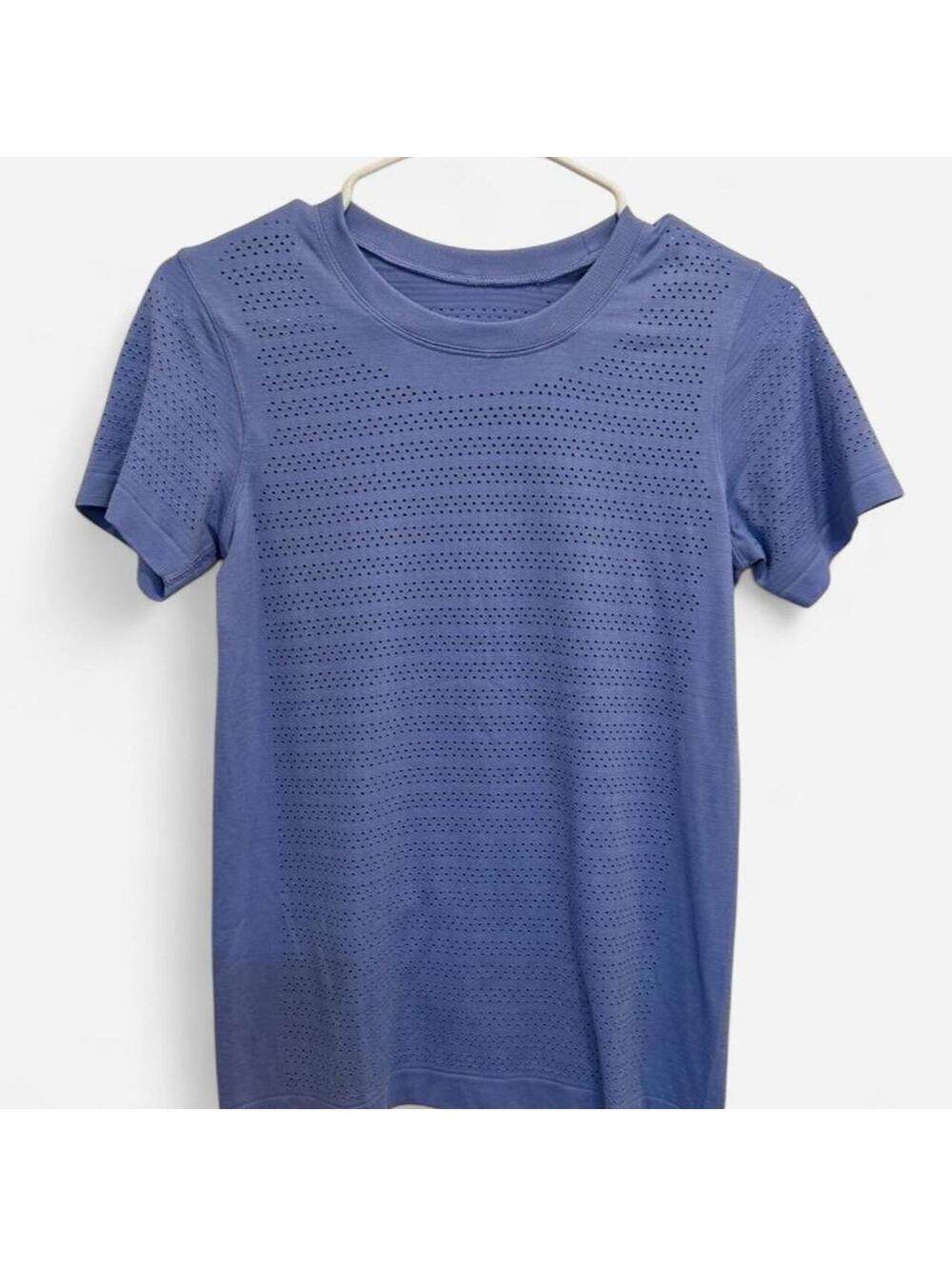 Lavender Lululemon Swiftly Tech short sleeve top.